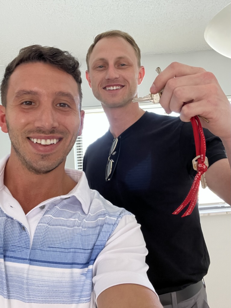 Tony Ubaldini with clients on closing day