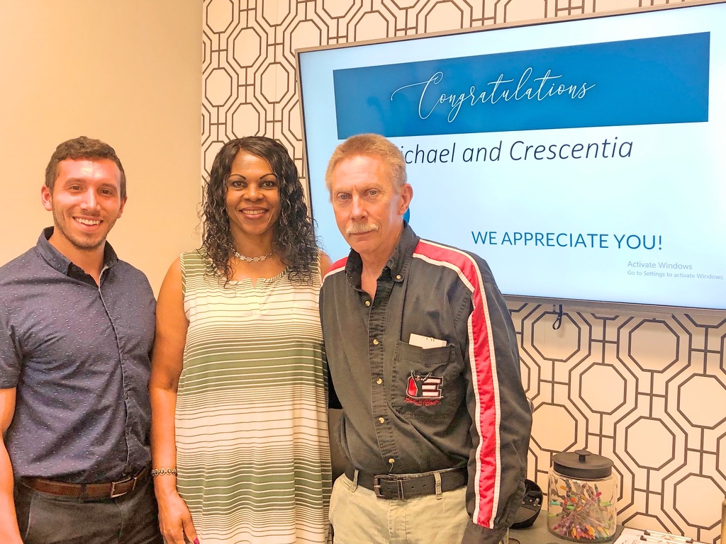 Tony Ubaldini with clients on closing day